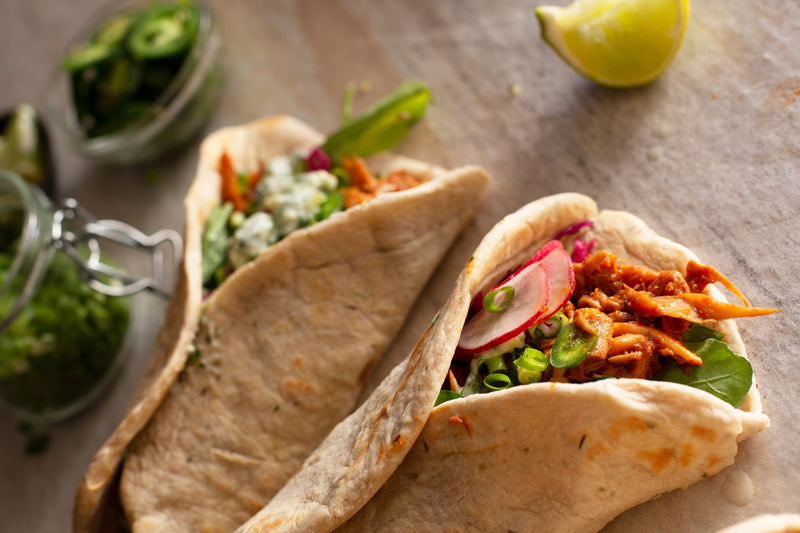 PULLED BBQ JACKFRUIT, MUSHROOM FLATBREADS WITH CHARGRILLED COURGETTES & VEGAN CORIANDER RAITA