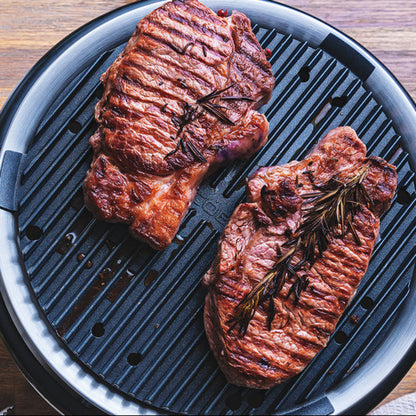 COBB Portable cooker with griddle and steaks