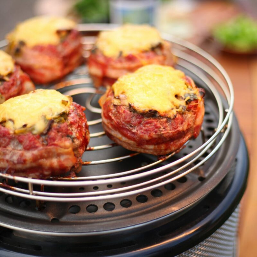 COBB Portable cooker with roasting rack on top cooking stuffed mushrooms